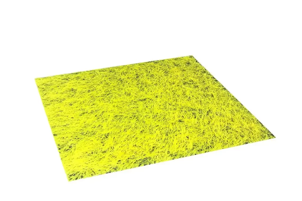 Yellow artificial grass carpet installed in an outdoor space in Dubai, adding a bright and cheerful touch to the area