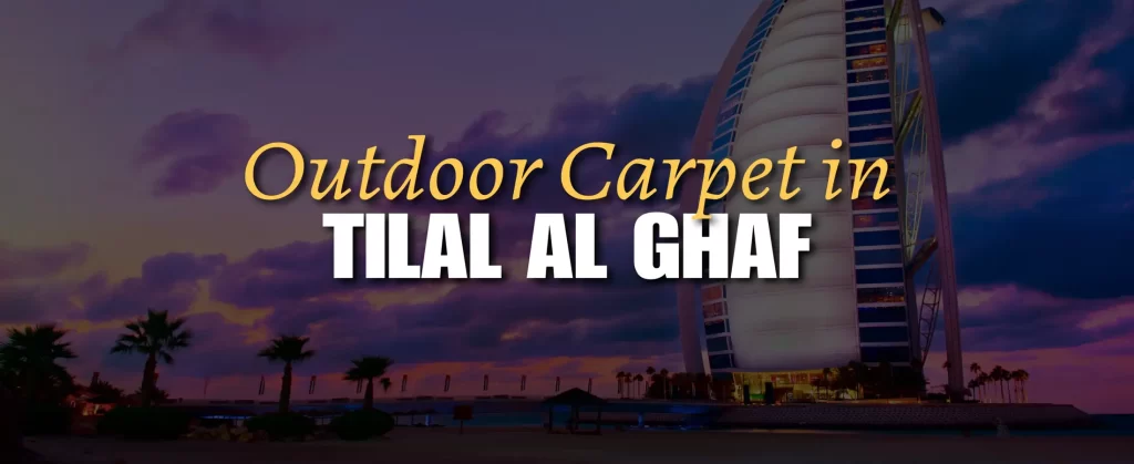 Outdoor carpet on a serene villa patio in Tilal Al Ghaf, Dubai, with contemporary outdoor seating, lush landscaping, and views of the community lagoon and modern architecture in the background
