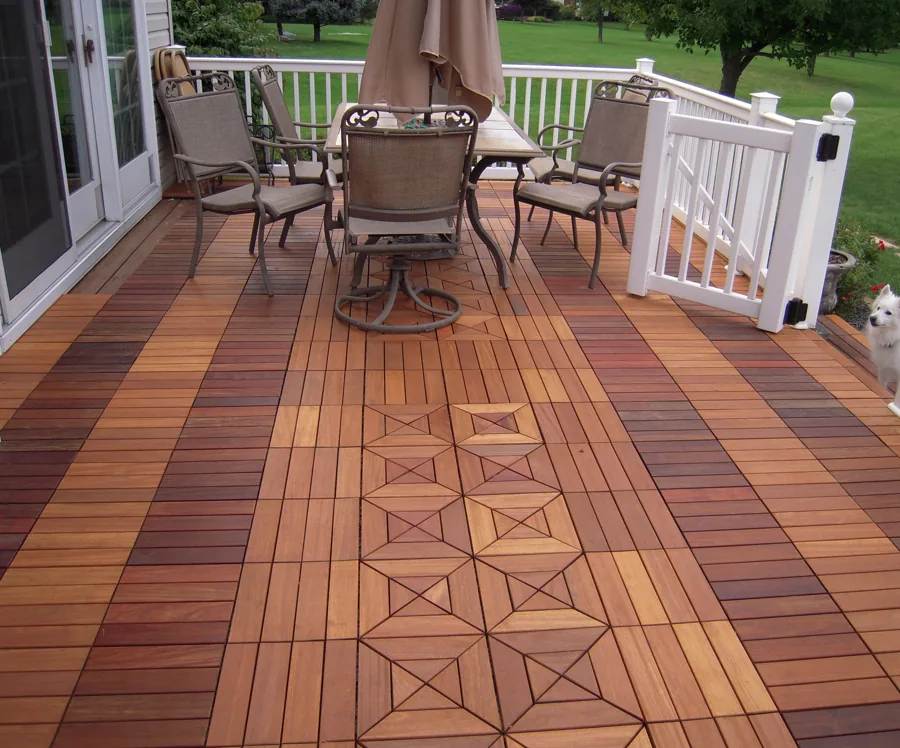 Patterned wooden interlocking deck tiles on patio